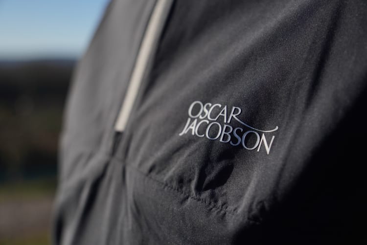Embrace the Greens with Style: Oscar Jacobson's Laguna Windproof Golf Jacket!