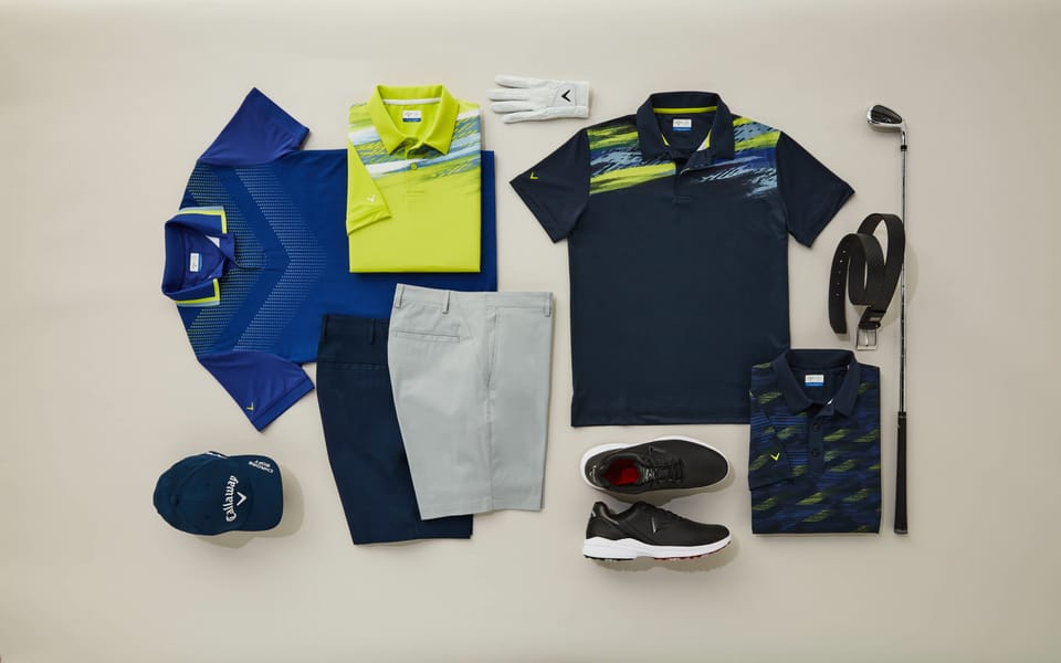 A variety of golf apparel laid out flat including polos, shoes and shorts.